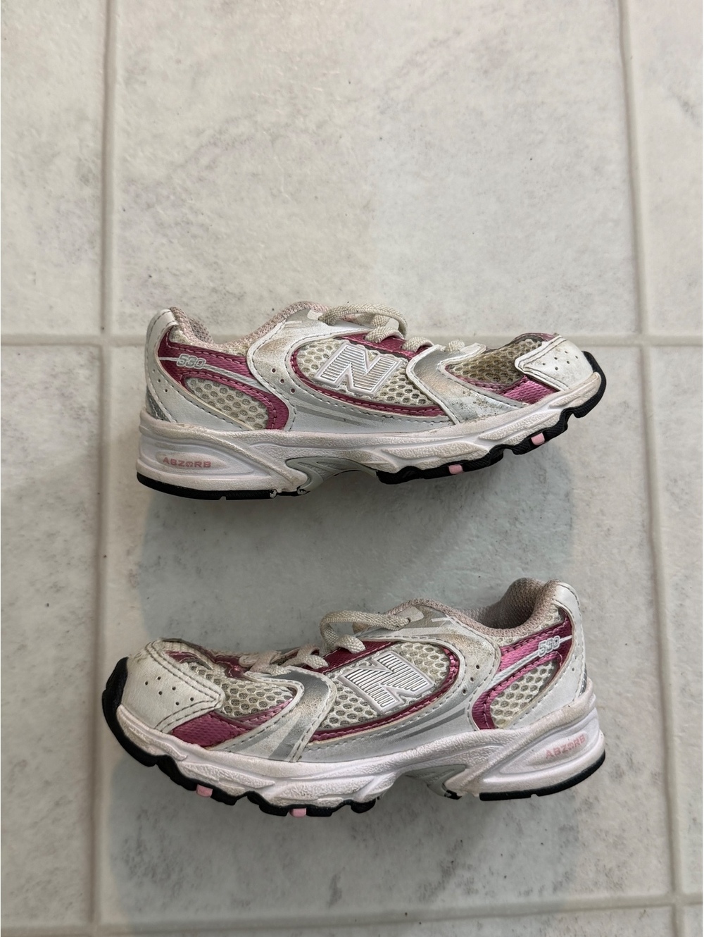 New Balance white silver and pink running shoes